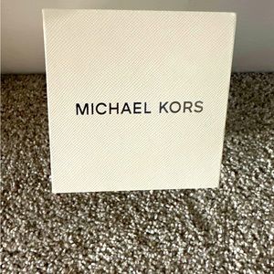 Brand NEW Michael Kors Watch for Sale. Never worn. 

selling on Amazon now $100